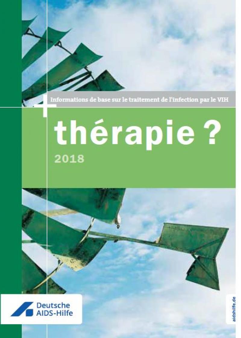 Grünes Windrad vor leicht bewölktem Himmer. Titel "therapie? 2018" in französischer Sprache